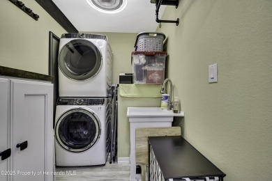 Discover this beautifully updated villa in the award-winning on Timber Pines Golf Course in Florida - for sale on GolfHomes.com, golf home, golf lot