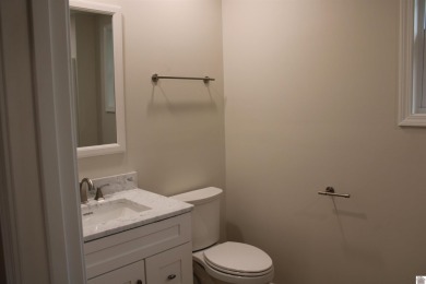 This beautifully renovated home has been completely gutted and on Benton Golf and Country Club in Kentucky - for sale on GolfHomes.com, golf home, golf lot