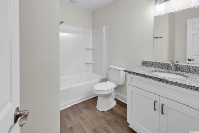 Windjammer Village community is conveniently located just inside on Glen Dornoch Waterway Golf Links in South Carolina - for sale on GolfHomes.com, golf home, golf lot
