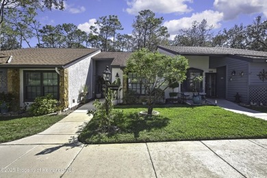 Discover this beautifully updated villa in the award-winning on Timber Pines Golf Course in Florida - for sale on GolfHomes.com, golf home, golf lot