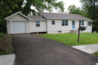 This beautifully renovated home has been completely gutted and on Benton Golf and Country Club in Kentucky - for sale on GolfHomes.com, golf home, golf lot