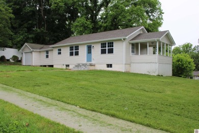 This beautifully renovated home has been completely gutted and on Benton Golf and Country Club in Kentucky - for sale on GolfHomes.com, golf home, golf lot