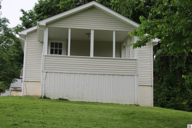 This beautifully renovated home has been completely gutted and on Benton Golf and Country Club in Kentucky - for sale on GolfHomes.com, golf home, golf lot