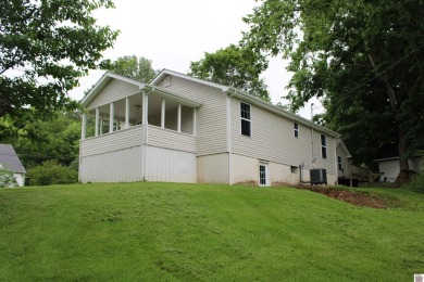 This beautifully renovated home has been completely gutted and on Benton Golf and Country Club in Kentucky - for sale on GolfHomes.com, golf home, golf lot