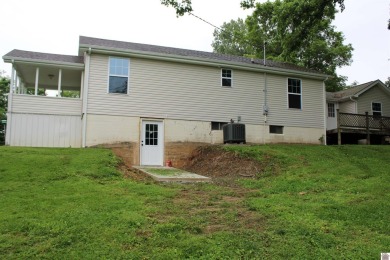 This beautifully renovated home has been completely gutted and on Benton Golf and Country Club in Kentucky - for sale on GolfHomes.com, golf home, golf lot