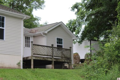 This beautifully renovated home has been completely gutted and on Benton Golf and Country Club in Kentucky - for sale on GolfHomes.com, golf home, golf lot