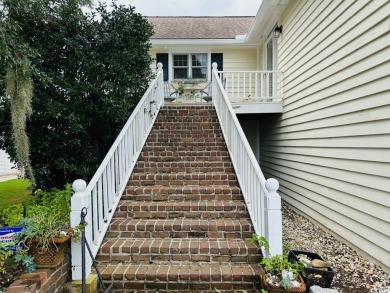 Welcome to 75 Marsh Hen Drive, a truly exceptional creekfront on Pawleys Plantation Golf and Country Club in South Carolina - for sale on GolfHomes.com, golf home, golf lot