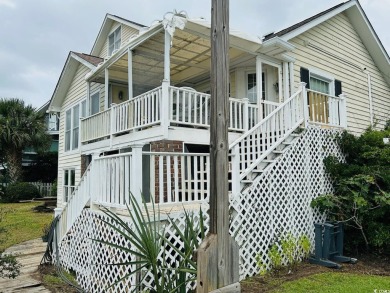 Welcome to 75 Marsh Hen Drive, a truly exceptional creekfront on Pawleys Plantation Golf and Country Club in South Carolina - for sale on GolfHomes.com, golf home, golf lot