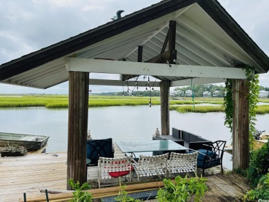 Welcome to 75 Marsh Hen Drive, a truly exceptional creekfront on Pawleys Plantation Golf and Country Club in South Carolina - for sale on GolfHomes.com, golf home, golf lot
