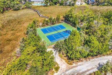 Windjammer Village community is conveniently located just inside on Glen Dornoch Waterway Golf Links in South Carolina - for sale on GolfHomes.com, golf home, golf lot