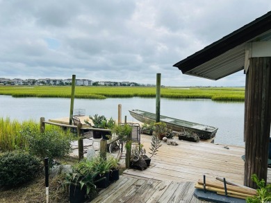 Welcome to 75 Marsh Hen Drive, a truly exceptional creekfront on Pawleys Plantation Golf and Country Club in South Carolina - for sale on GolfHomes.com, golf home, golf lot
