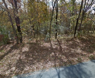 Great buildable lot in beautiful Diamondhead community.  Enjoy on Diamondhead Golf and Country Club in Arkansas - for sale on GolfHomes.com, golf home, golf lot