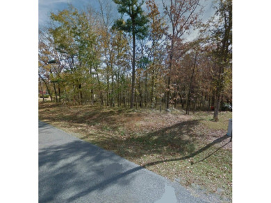 Great buildable lot in beautiful Diamondhead community.  Enjoy on Diamondhead Golf and Country Club in Arkansas - for sale on GolfHomes.com, golf home, golf lot