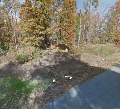 Great buildable lot in beautiful Diamondhead community.  Enjoy on Diamondhead Golf and Country Club in Arkansas - for sale on GolfHomes.com, golf home, golf lot