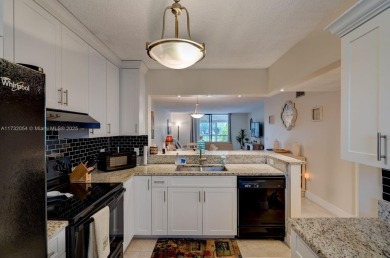 COME AND FALL IN LOVE WITH THIS TASTEFULLY RENOVATED CONDO! 2 on Inverrary Country Club in Florida - for sale on GolfHomes.com, golf home, golf lot