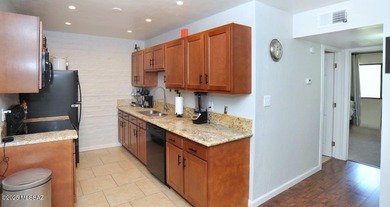 Lovely light and bright 2/bed 2/bath corner, upstairs condo with on Oro Valley Country Club in Arizona - for sale on GolfHomes.com, golf home, golf lot