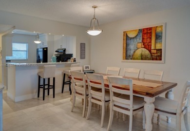 COME AND FALL IN LOVE WITH THIS TASTEFULLY RENOVATED CONDO! 2 on Inverrary Country Club in Florida - for sale on GolfHomes.com, golf home, golf lot