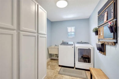 FEATURED ON HGTV'S HOUSE HUNTERS! -This stunning 4-bedroom on Bradenton Country Club in Florida - for sale on GolfHomes.com, golf home, golf lot