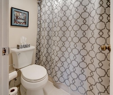 COME AND FALL IN LOVE WITH THIS TASTEFULLY RENOVATED CONDO! 2 on Inverrary Country Club in Florida - for sale on GolfHomes.com, golf home, golf lot