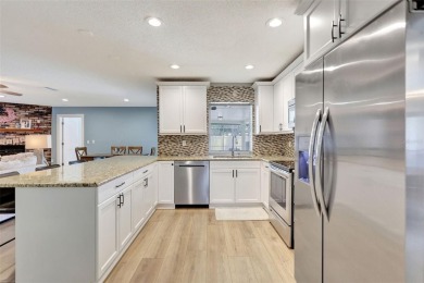 FEATURED ON HGTV'S HOUSE HUNTERS! -This stunning 4-bedroom on Bradenton Country Club in Florida - for sale on GolfHomes.com, golf home, golf lot