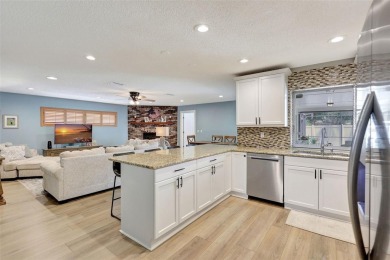 FEATURED ON HGTV'S HOUSE HUNTERS! -This stunning 4-bedroom on Bradenton Country Club in Florida - for sale on GolfHomes.com, golf home, golf lot