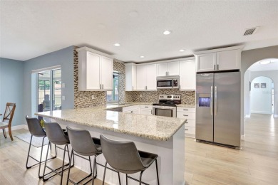 FEATURED ON HGTV'S HOUSE HUNTERS! -This stunning 4-bedroom on Bradenton Country Club in Florida - for sale on GolfHomes.com, golf home, golf lot