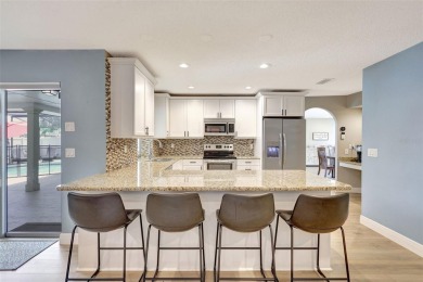 FEATURED ON HGTV'S HOUSE HUNTERS! -This stunning 4-bedroom on Bradenton Country Club in Florida - for sale on GolfHomes.com, golf home, golf lot