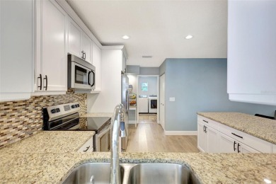 FEATURED ON HGTV'S HOUSE HUNTERS! -This stunning 4-bedroom on Bradenton Country Club in Florida - for sale on GolfHomes.com, golf home, golf lot
