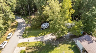 Discover a pristine 0.14-acre lot tucked away on a quiet private on River Golf and Country Club at Lake Royale in North Carolina - for sale on GolfHomes.com, golf home, golf lot