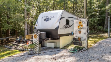 Discover a pristine 0.14-acre lot tucked away on a quiet private on River Golf and Country Club at Lake Royale in North Carolina - for sale on GolfHomes.com, golf home, golf lot
