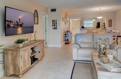 COME AND FALL IN LOVE WITH THIS TASTEFULLY RENOVATED CONDO! 2 on Inverrary Country Club in Florida - for sale on GolfHomes.com, golf home, golf lot