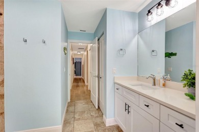 FEATURED ON HGTV'S HOUSE HUNTERS! -This stunning 4-bedroom on Bradenton Country Club in Florida - for sale on GolfHomes.com, golf home, golf lot