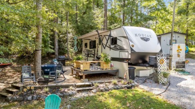 Discover a pristine 0.14-acre lot tucked away on a quiet private on River Golf and Country Club at Lake Royale in North Carolina - for sale on GolfHomes.com, golf home, golf lot