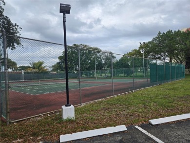 COME AND FALL IN LOVE WITH THIS TASTEFULLY RENOVATED CONDO! 2 on Inverrary Country Club in Florida - for sale on GolfHomes.com, golf home, golf lot