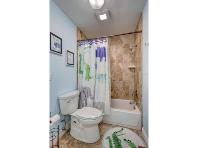 FEATURED ON HGTV'S HOUSE HUNTERS! -This stunning 4-bedroom on Bradenton Country Club in Florida - for sale on GolfHomes.com, golf home, golf lot
