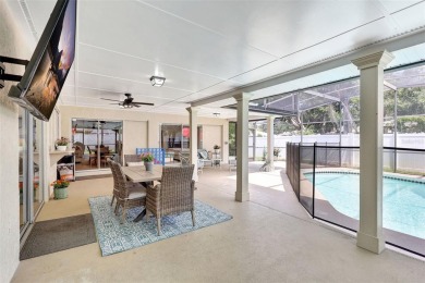 FEATURED ON HGTV'S HOUSE HUNTERS! -This stunning 4-bedroom on Bradenton Country Club in Florida - for sale on GolfHomes.com, golf home, golf lot