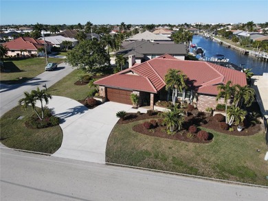 Welcome to Punta Gorda Isles and this 3 bed, 2 bath home with an on Saint Andrews South Golf Club in Florida - for sale on GolfHomes.com, golf home, golf lot