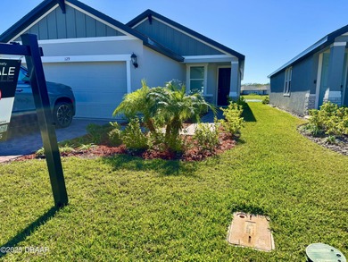 WATERFRONT HOME - PRICED TO SELL! Stunning, energy-efficient on LPGA International Golf Course in Florida - for sale on GolfHomes.com, golf home, golf lot