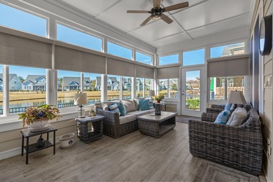 This exquisite single-level home on a pristine lake lot in the on Myrtlewood Golf Course and Club  in South Carolina - for sale on GolfHomes.com, golf home, golf lot