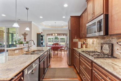 Step into luxury with this stunning 4-bedroom, 3-bathroom on Compass Pointe Golf Course in North Carolina - for sale on GolfHomes.com, golf home, golf lot