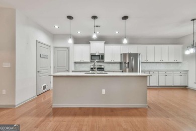 WHAT'S UNIQUE ABOUT THIS HOME: This home has more cabinetry in on Reunion Golf Club in Georgia - for sale on GolfHomes.com, golf home, golf lot