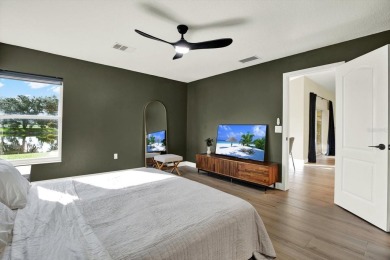 Wake up to panoramic views of tranquil lakes and the perfectly on Links At Greenfield Plantation in Florida - for sale on GolfHomes.com, golf home, golf lot