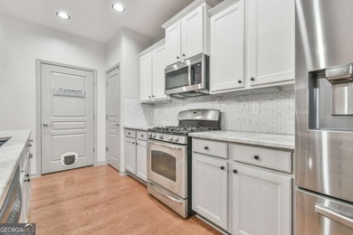 WHAT'S UNIQUE ABOUT THIS HOME: This home has more cabinetry in on Reunion Golf Club in Georgia - for sale on GolfHomes.com, golf home, golf lot