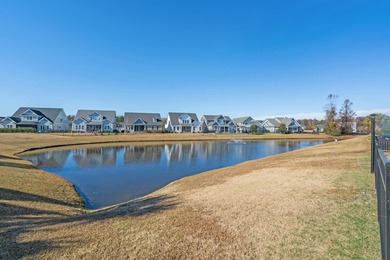This exquisite single-level home on a pristine lake lot in the on Myrtlewood Golf Course and Club  in South Carolina - for sale on GolfHomes.com, golf home, golf lot