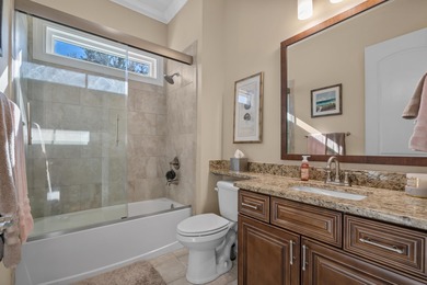 This exquisite single-level home on a pristine lake lot in the on Myrtlewood Golf Course and Club  in South Carolina - for sale on GolfHomes.com, golf home, golf lot