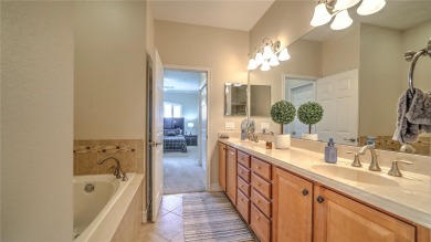 Welcome to this beautifully maintained 2-story townhome located on Eagle Creek Golf Club in Florida - for sale on GolfHomes.com, golf home, golf lot