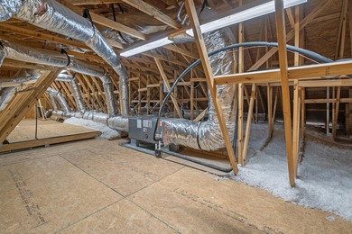 This exquisite single-level home on a pristine lake lot in the on Myrtlewood Golf Course and Club  in South Carolina - for sale on GolfHomes.com, golf home, golf lot