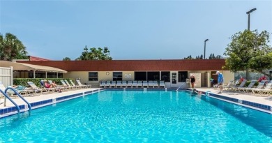 THIS MUST BE THE PLACE! Opportunity knocks at this top floor on The American Golf Club in Florida - for sale on GolfHomes.com, golf home, golf lot