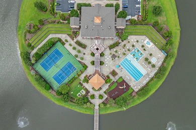 This exquisite single-level home on a pristine lake lot in the on Myrtlewood Golf Course and Club  in South Carolina - for sale on GolfHomes.com, golf home, golf lot