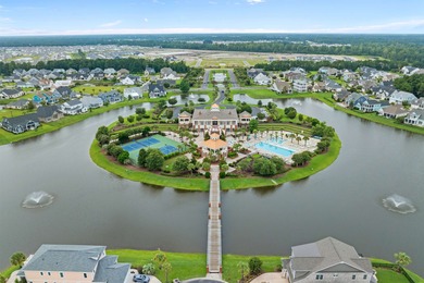 This exquisite single-level home on a pristine lake lot in the on Myrtlewood Golf Course and Club  in South Carolina - for sale on GolfHomes.com, golf home, golf lot